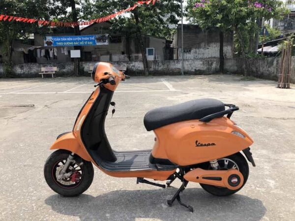 xe máy điện vespa màu cam cũ